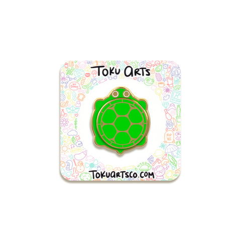 Turtle Sandbox Enamel Pin by Toku Arts